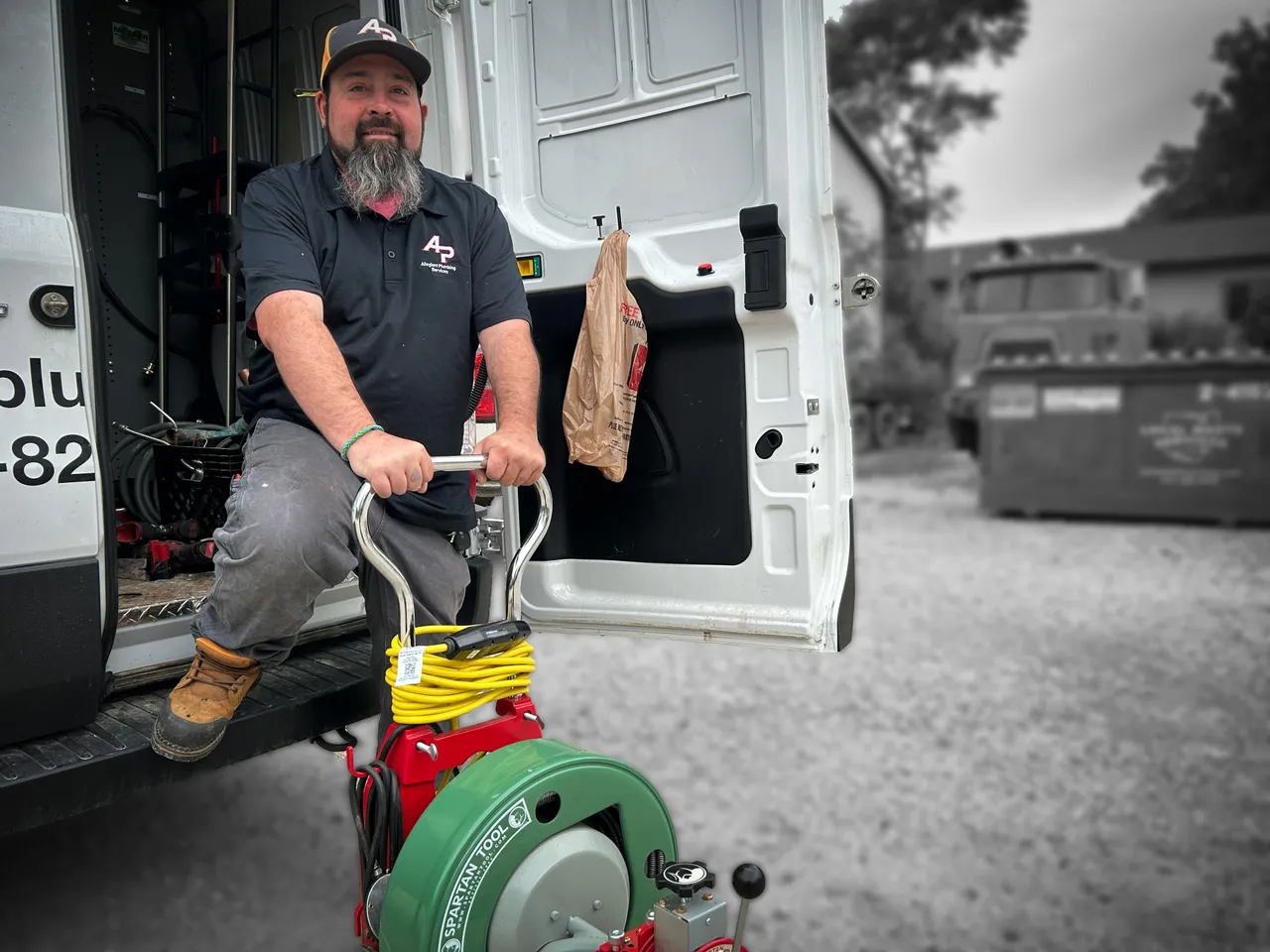 Allegiant Plumbing team members collaborating and training together, showcasing company culture and professional development