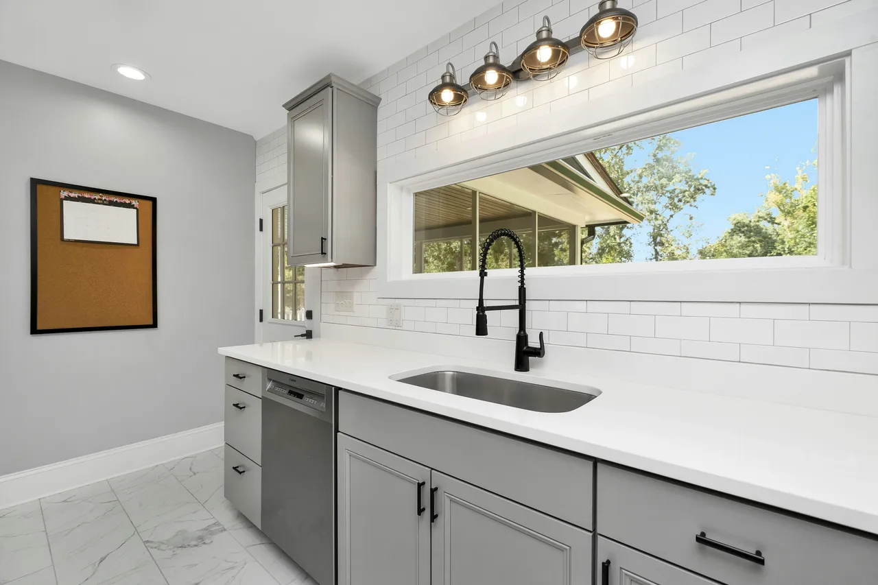 Modern kitchen sink with clean plumbing fixtures