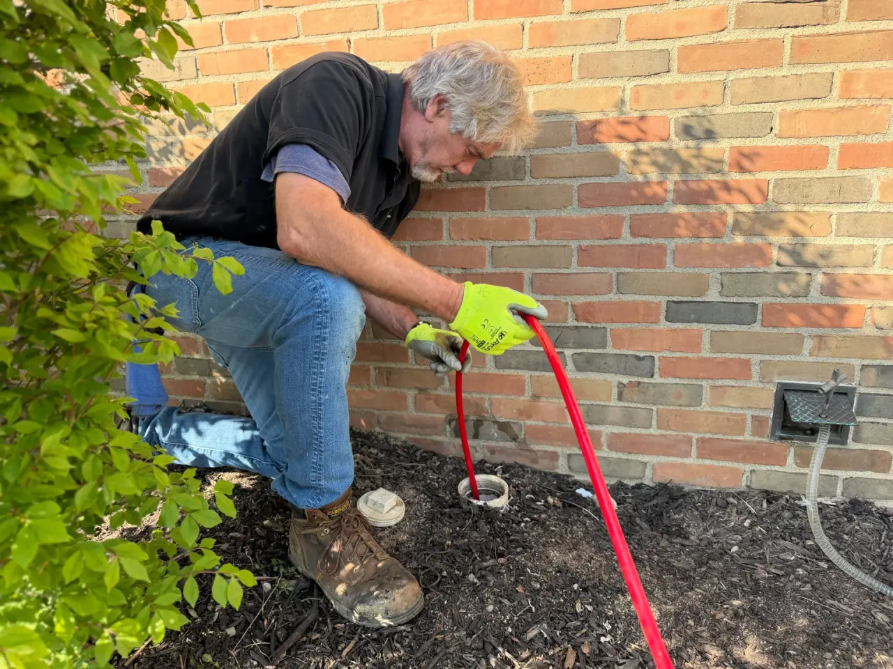 Allegiant Plumbing technician performing professional drain cleaning in Columbus, Ohio