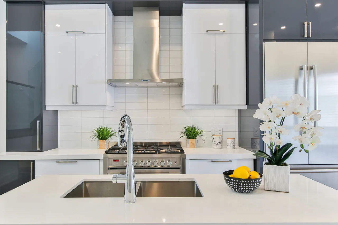 Modern kitchen faucet with clean lines and brushed finish