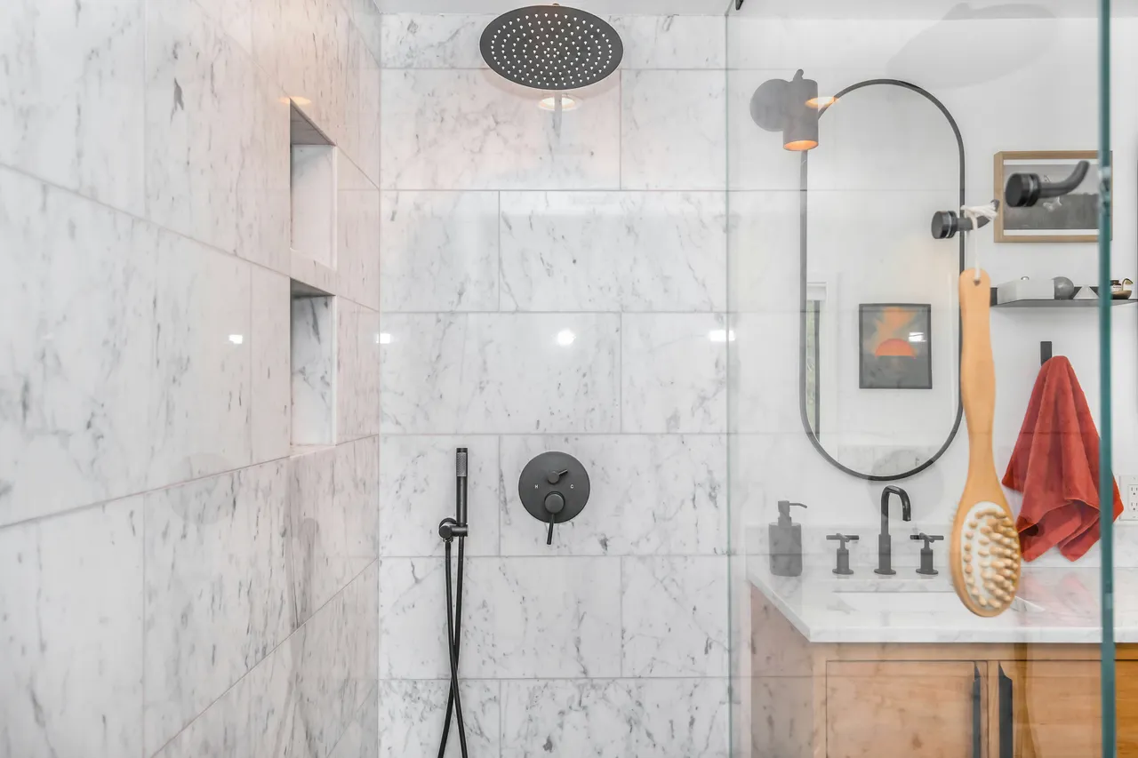 Luxurious walk-in shower with modern fixtures