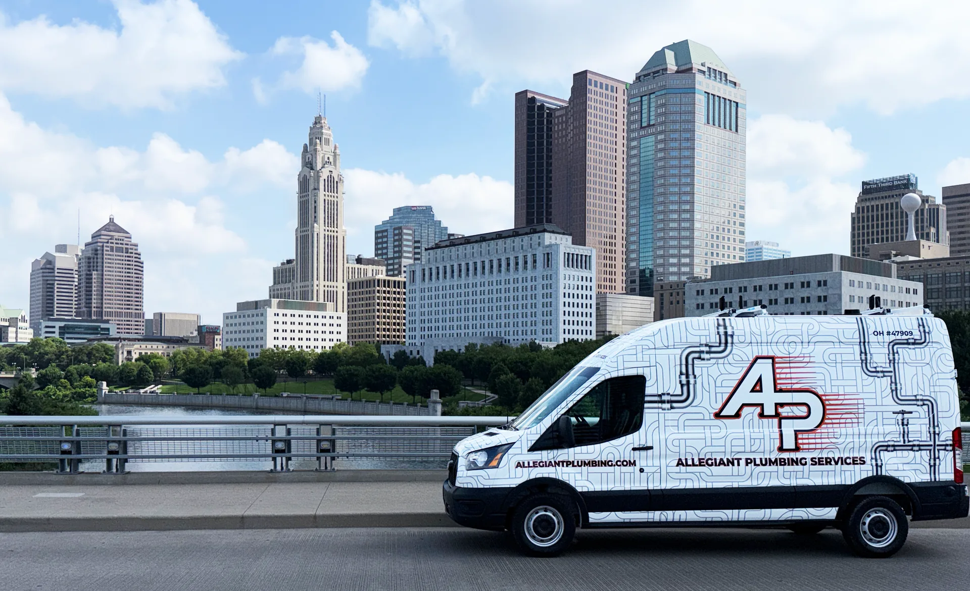 Allegiant Plumbing service van with Columbus, Ohio skyline