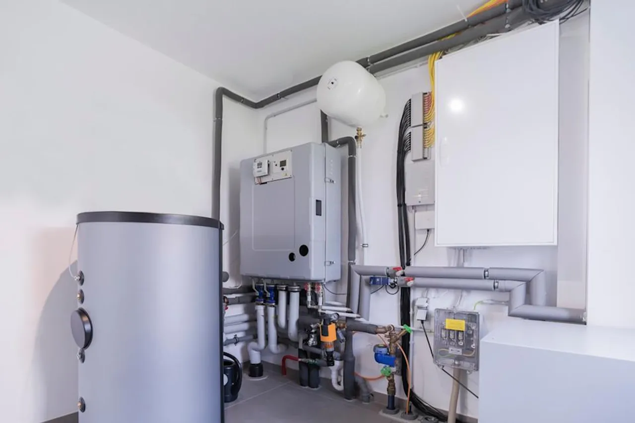 Professional technician installing a new tankless water heater